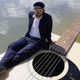 Illustration for article titled Josh Pyke's Guitar Boat Floats on an Ocean of Rock